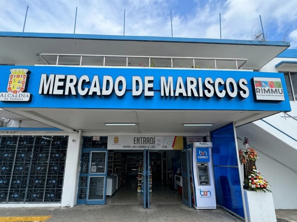Bustling seafood market stalls at night with fresh ceviche being served at Mercado de Mariscos in Panama City